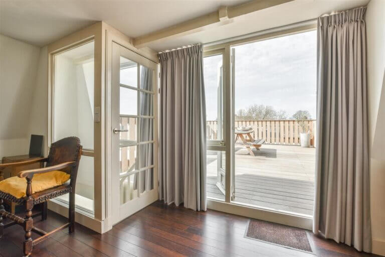 Spacious bright bedroom with sa stinning view from the panoramic window